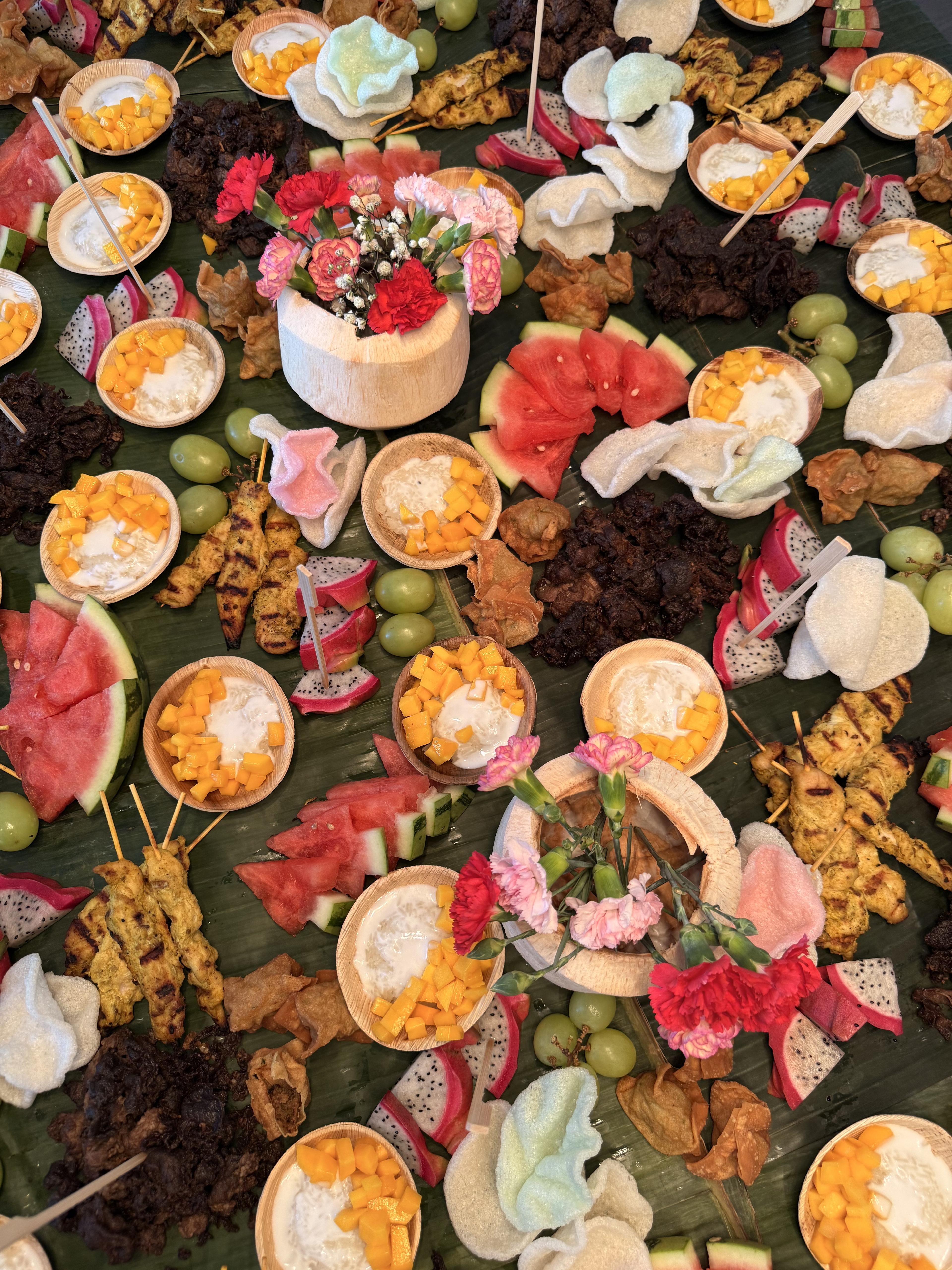 A spread of Soi Ram Thai street food laid out for catering